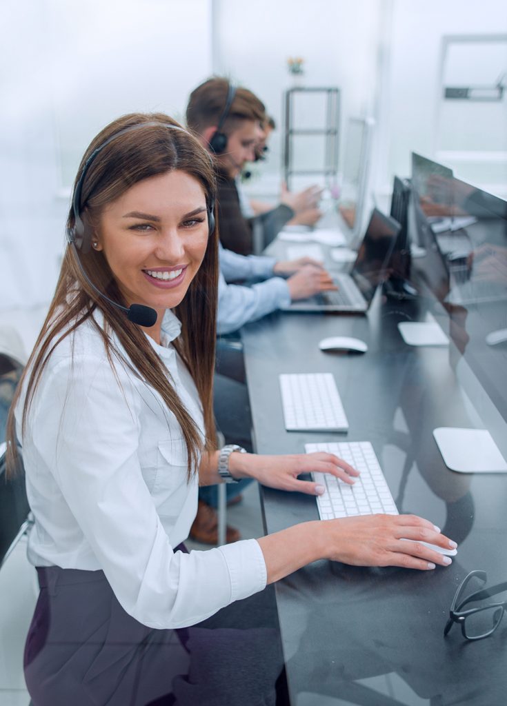 side-viewsmiling-call-center-employee-workplace